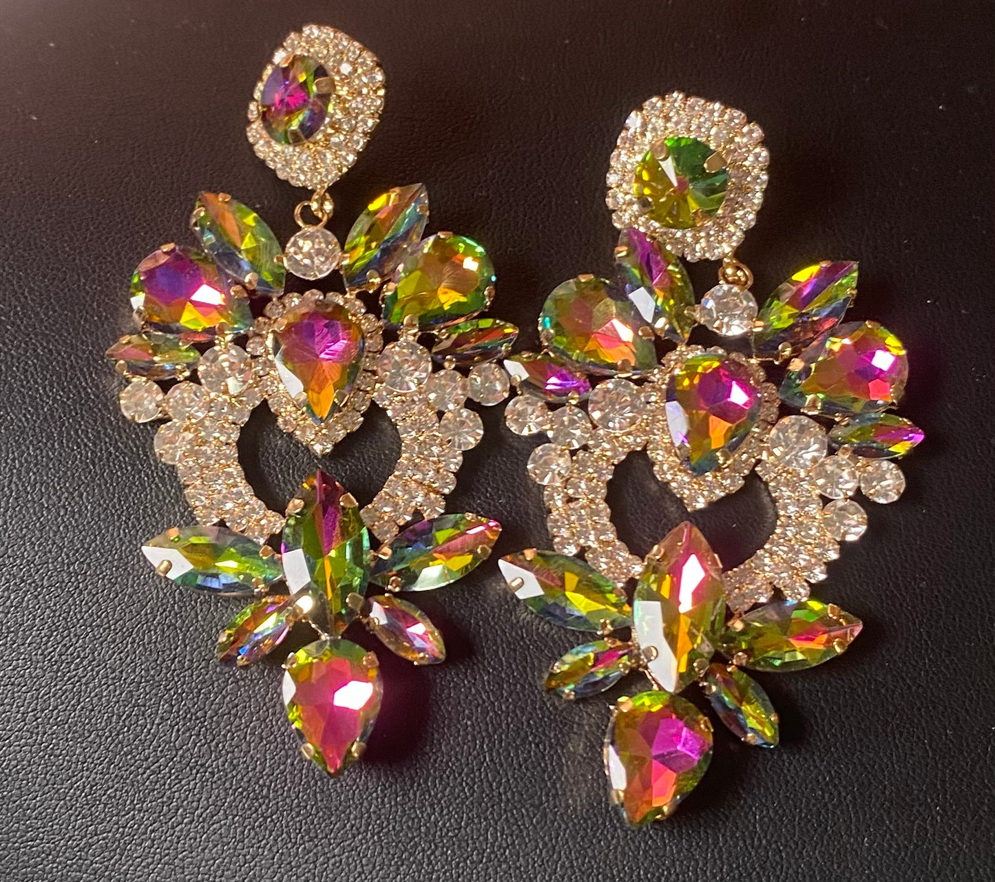 Gold oil spill peacock earrings
